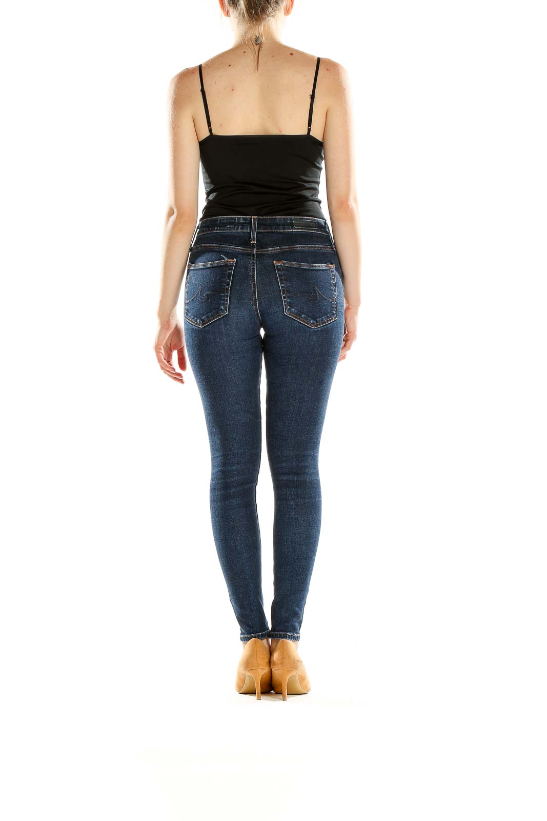 Side view of Adriano Goldschmied dark blue skinny jeans on model