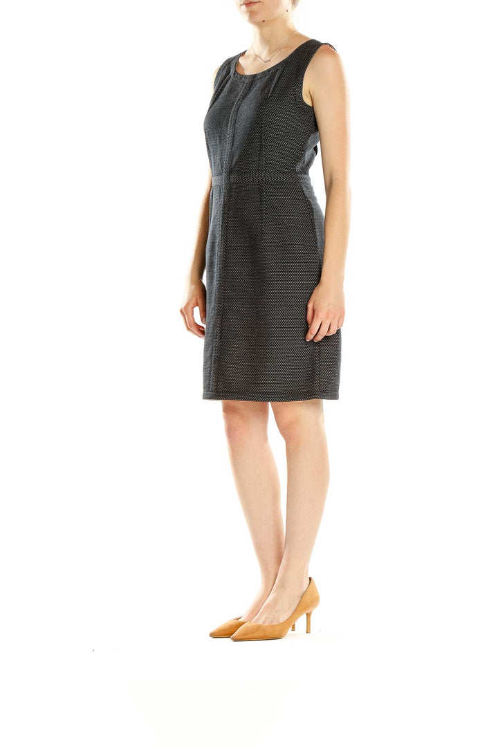 Front view of DKNY black textured sleeveless sheath dress