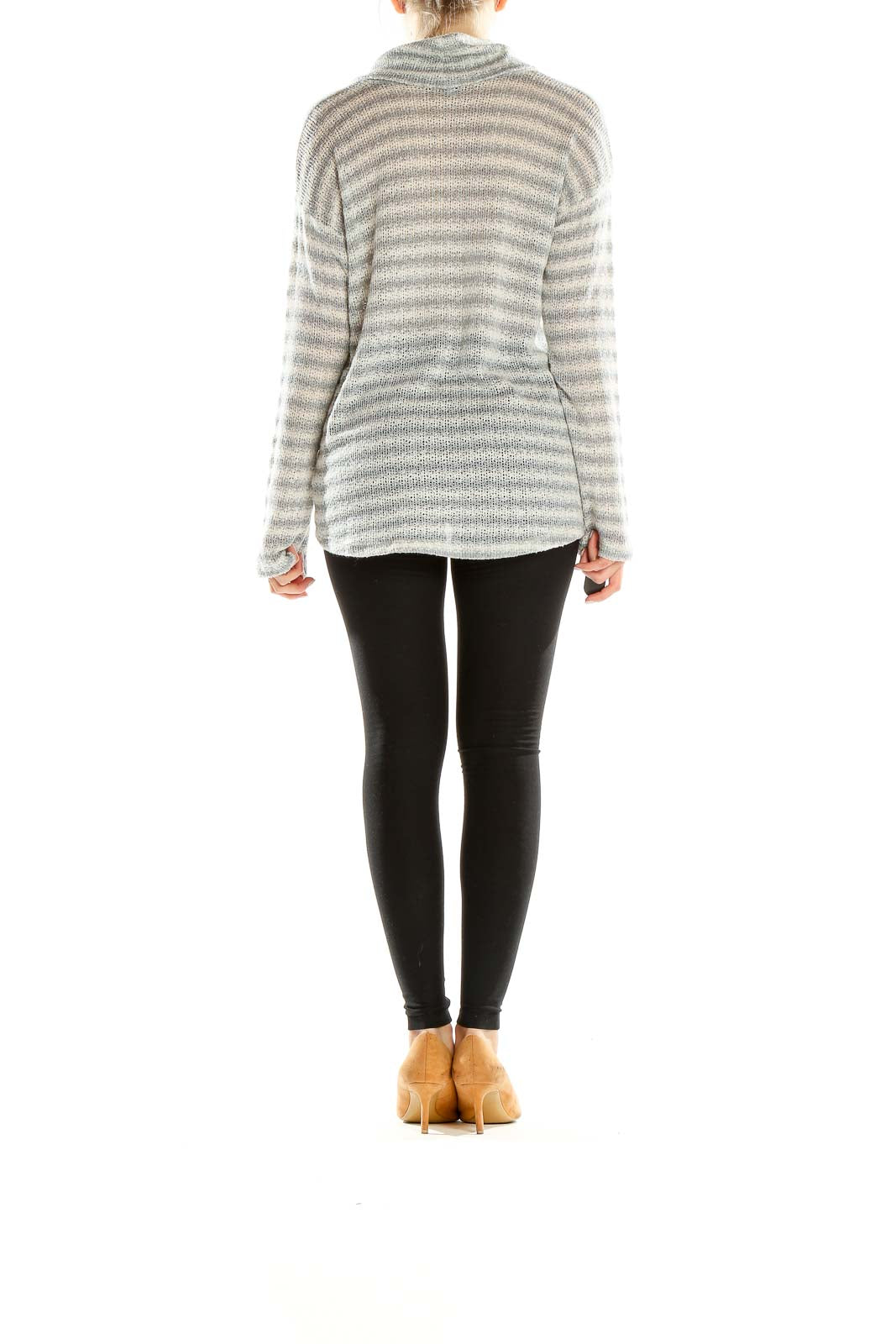 Side view of Splendid gray and white striped cowl neck sweater with black leggings