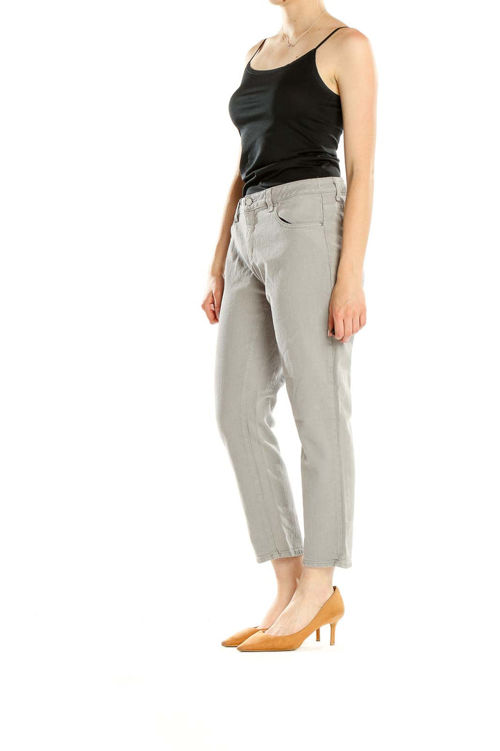 Front view of MICHAEL Michael Kors light gray cropped denim jeans