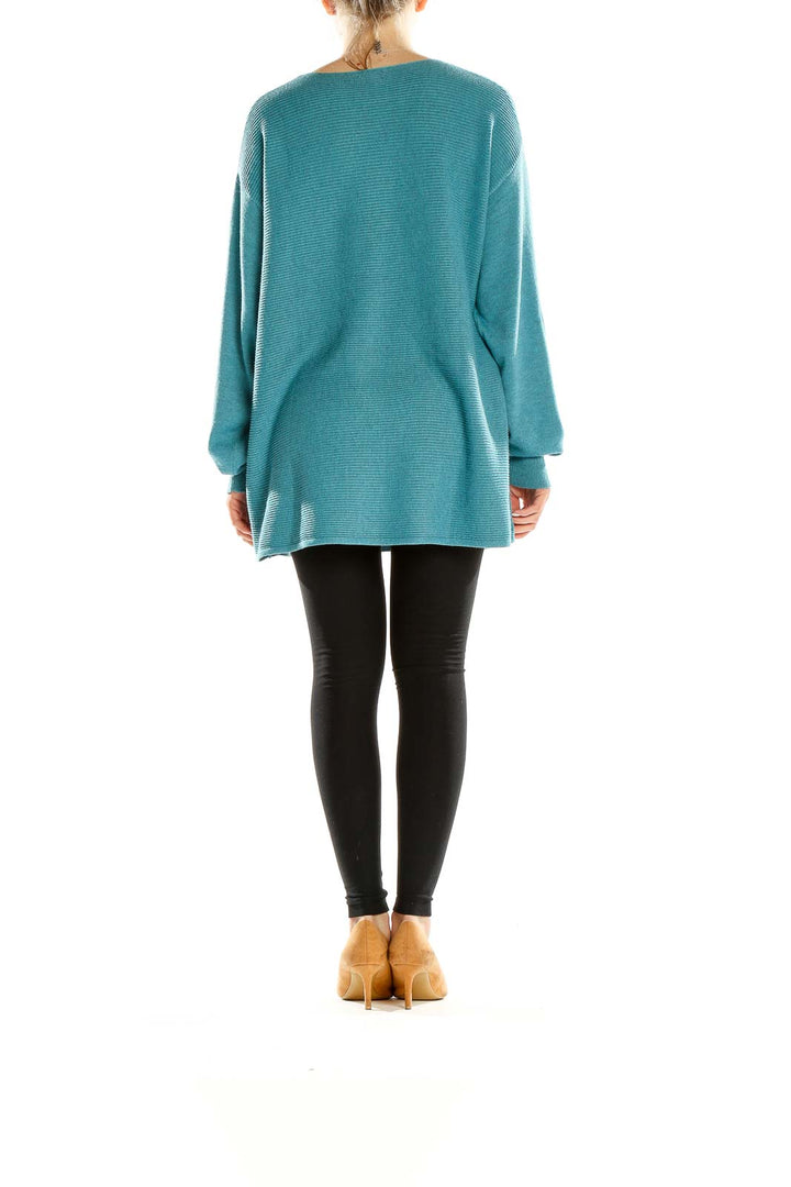Side view of teal Ella Moss oversized V-neck ribbed sweater on model