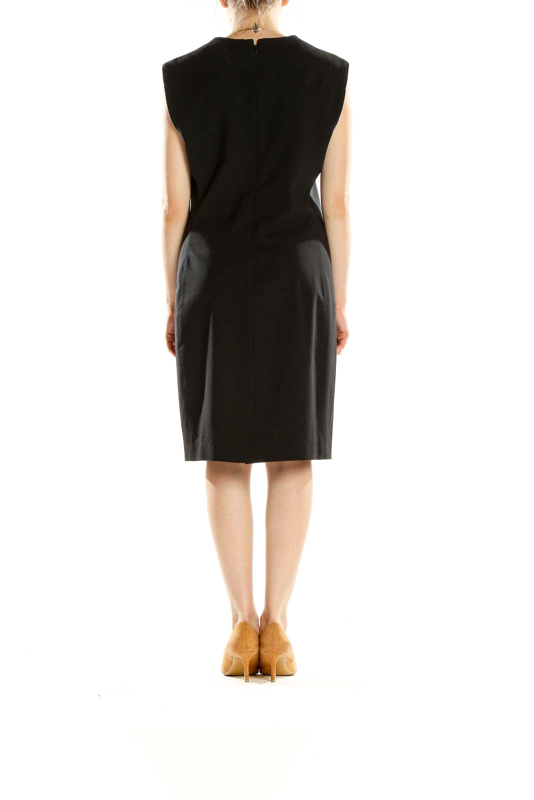 Side view of Theory black sleeveless shift dress with model