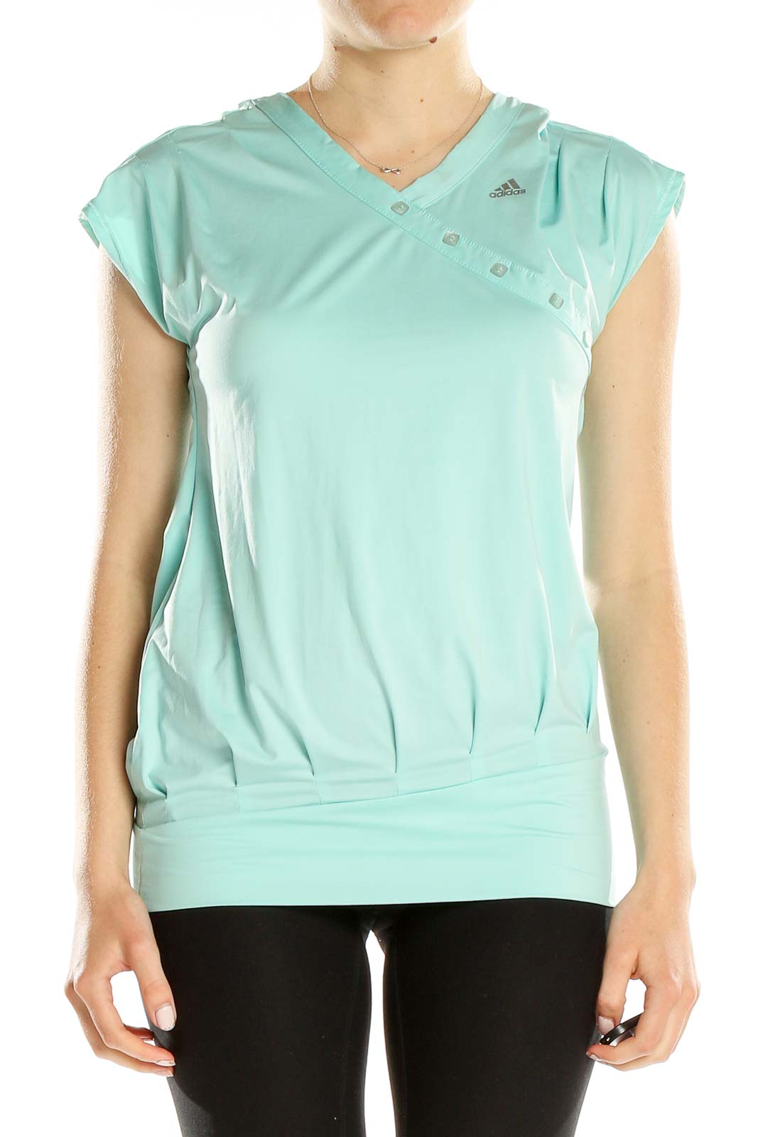 Front view of Adidas mint green V-neck athletic top with asymmetrical button detail