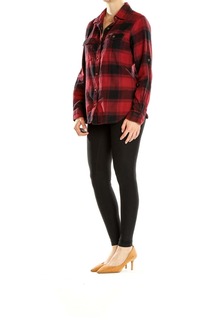Front view of red and black plaid Columbia flannel shirt