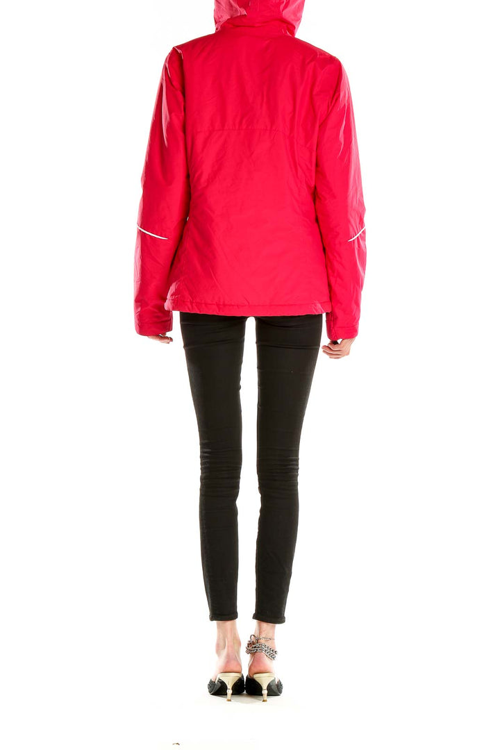 Side view of red Columbia ski jacket showing white piping detail