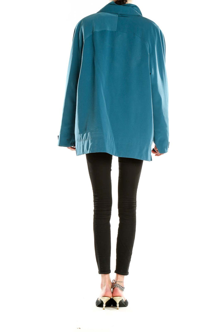 Side view of teal Gallery zip-up jacket showing length and fit