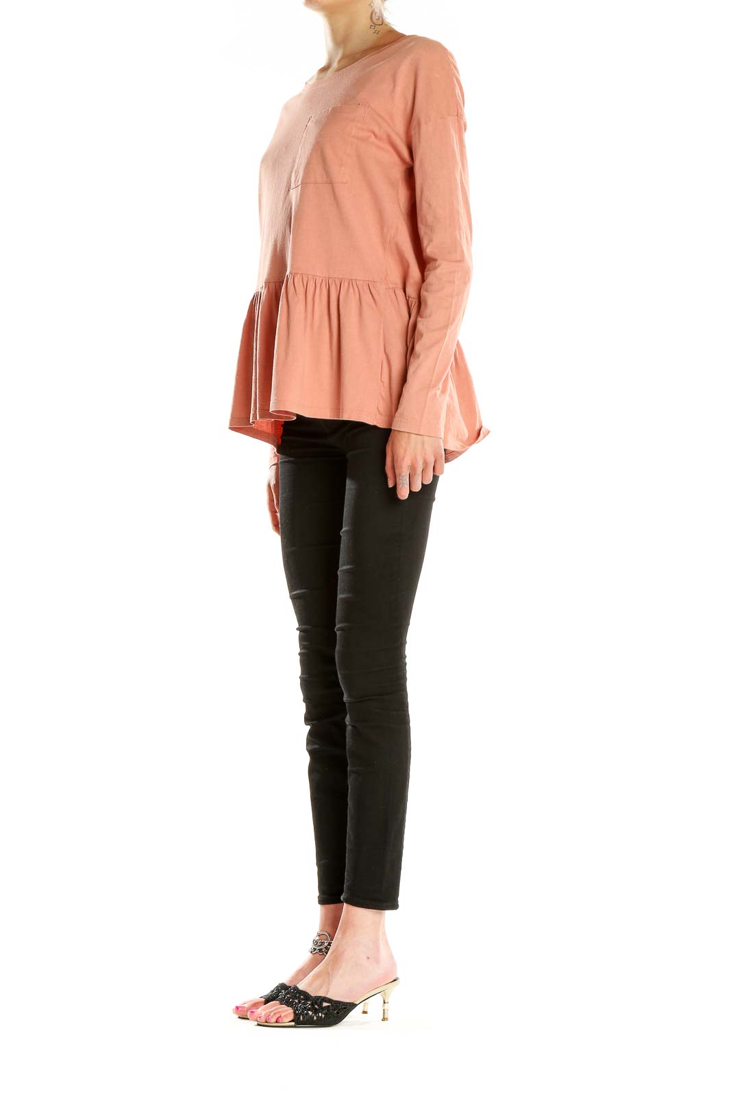 Front view of peach long-sleeve peplum top by For the Republic