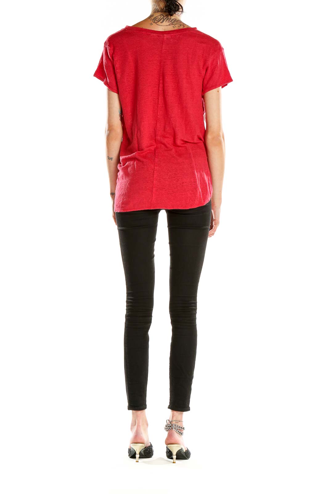 Side view of red Tahari V-neck T-shirt on model with black pants
