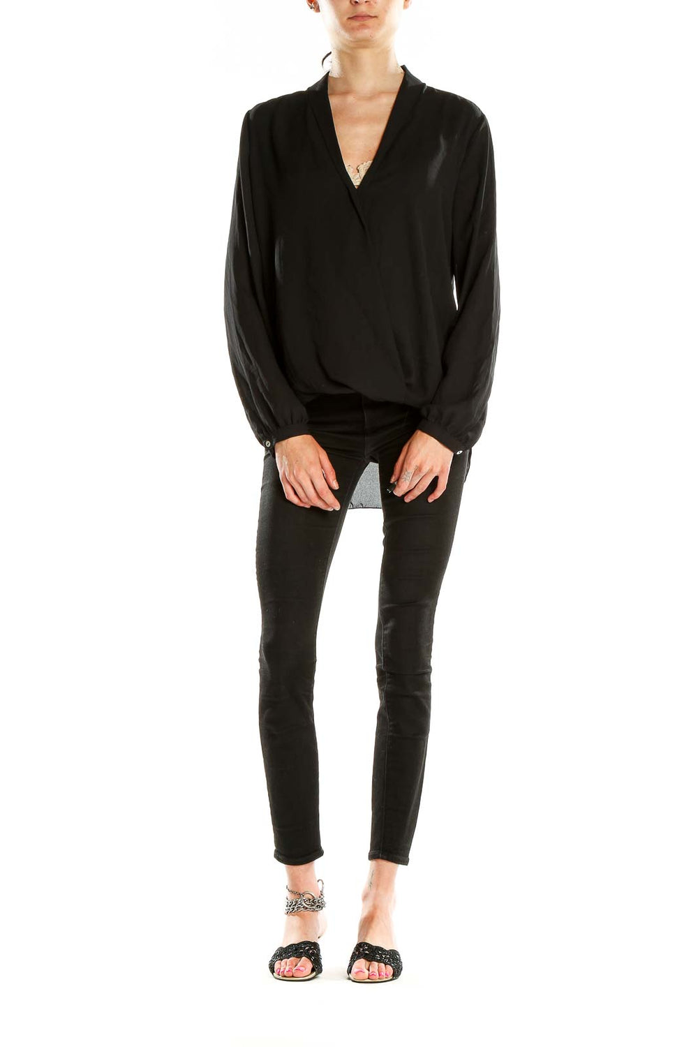 Front view of Max Studio black wrap blouse with V-neckline