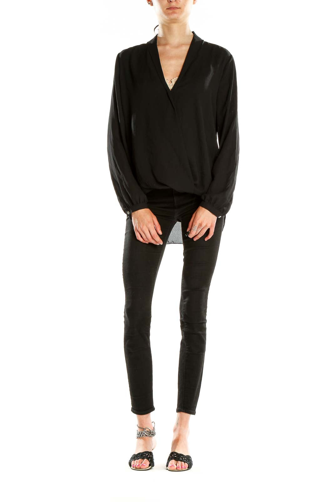 Front view of Max Studio black wrap blouse with V-neckline