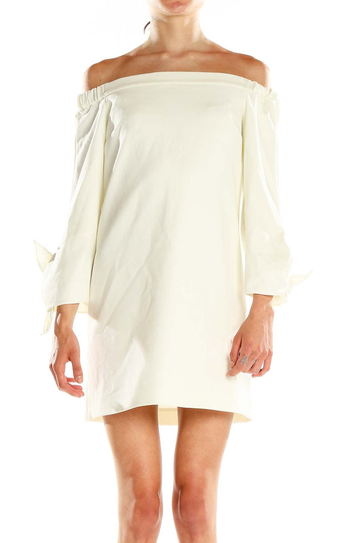 Front view of Tibi ivory off-shoulder mini dress with bell sleeves