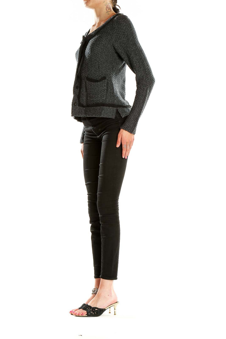 Front view of Banana Republic gray textured knit cardigan jacket with black trim