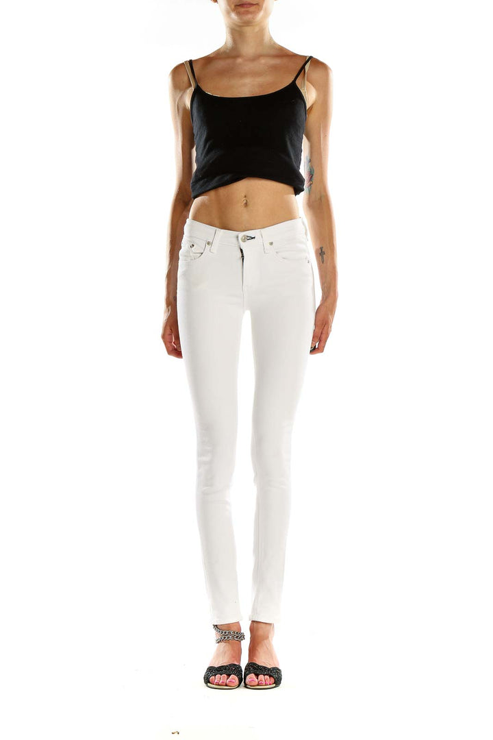 Front view of Rag & Bone white skinny jeans on model