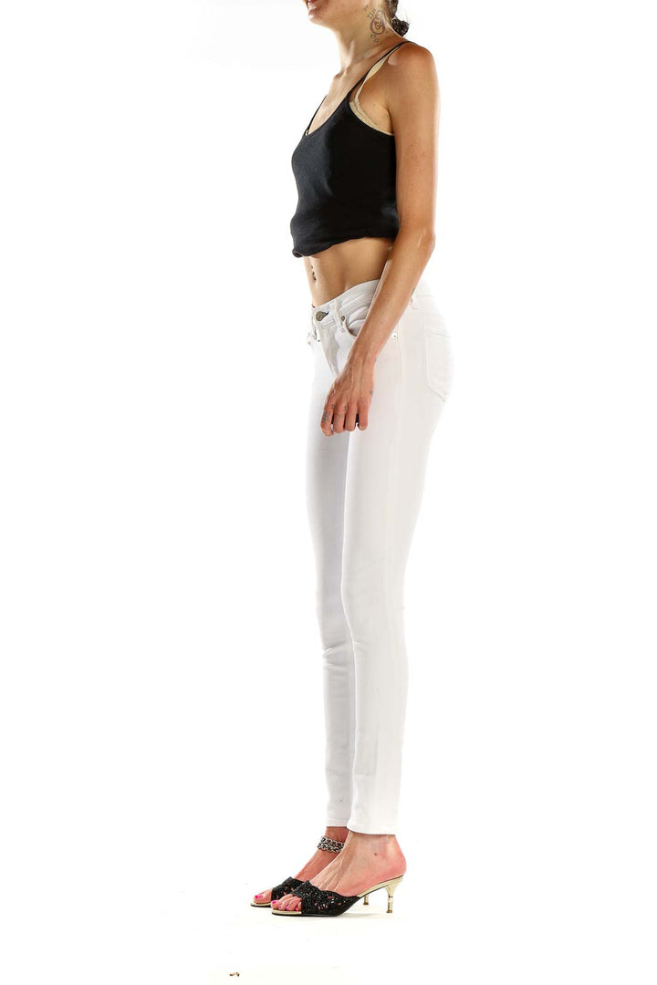 Front view of Rag & Bone white skinny jeans on model