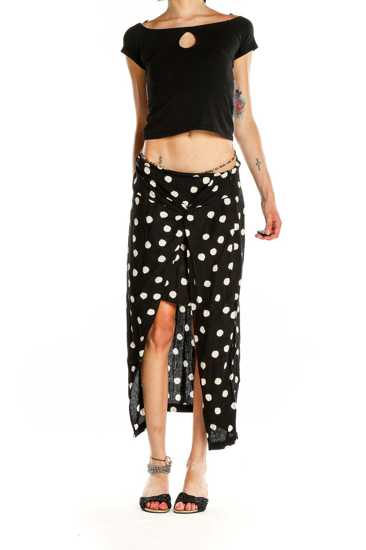 Front view of Urban Outfitters Black and White Polka Dot Maxi Skirt with front slit