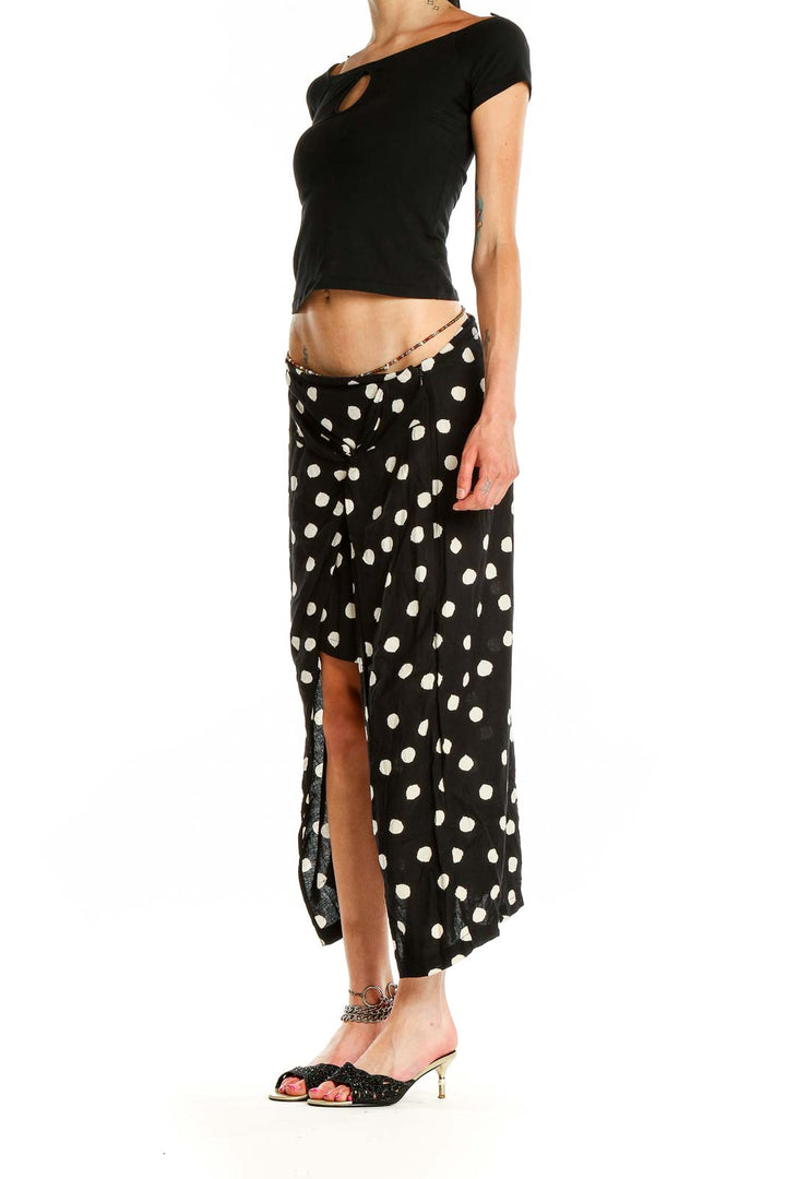 Front view of Urban Outfitters Black and White Polka Dot Maxi Skirt with front slit