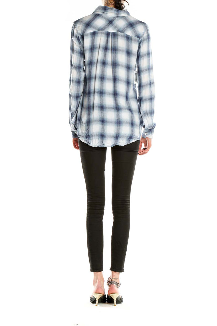 Back view of Rails blue and white plaid button-up shirt on model