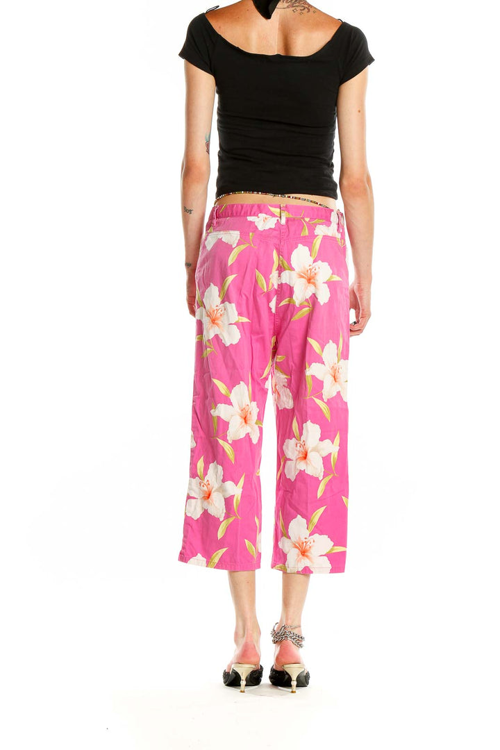 Side view of model wearing pink floral cropped wide-leg pants by Lauren Ralph Lauren