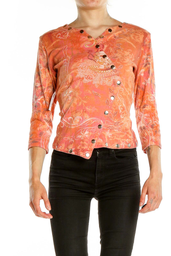 Front view of Boho Chic coral floral asymmetric button-up top
