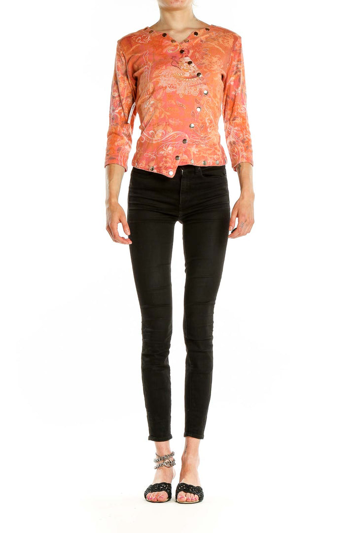 Front view of Boho Chic coral floral asymmetric button-up top