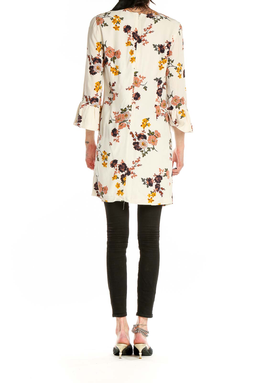 Back view of Sanctuary cream floral mini dress showing all-over print