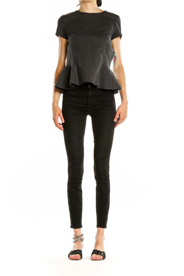 Front view of J.Crew charcoal peplum short sleeve top