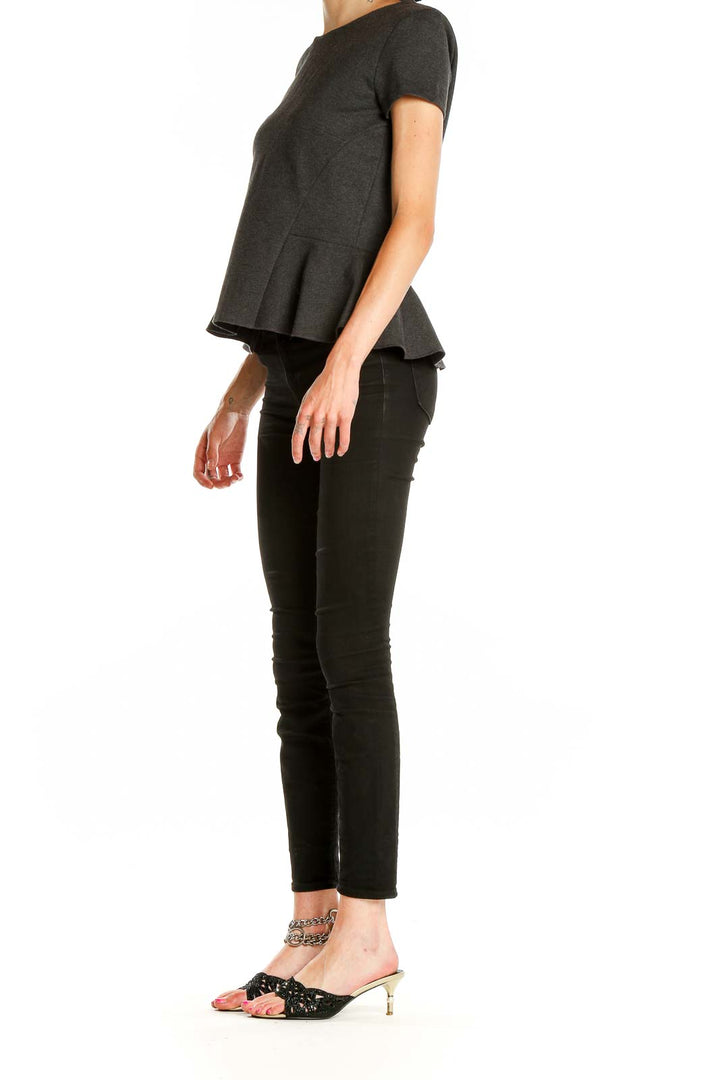 Front view of J.Crew charcoal peplum short sleeve top