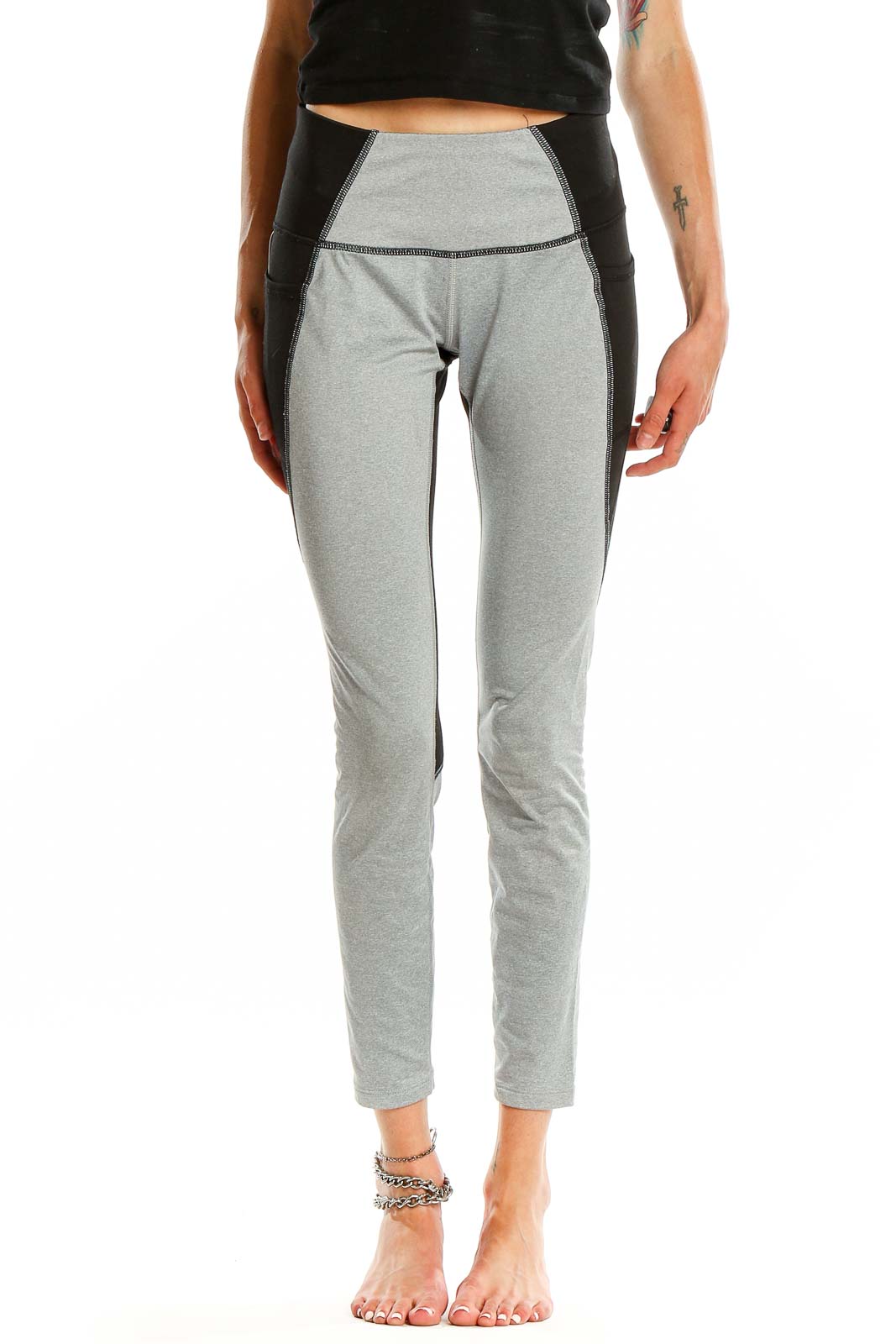 Front view of gray and black color block high-waisted activewear leggings