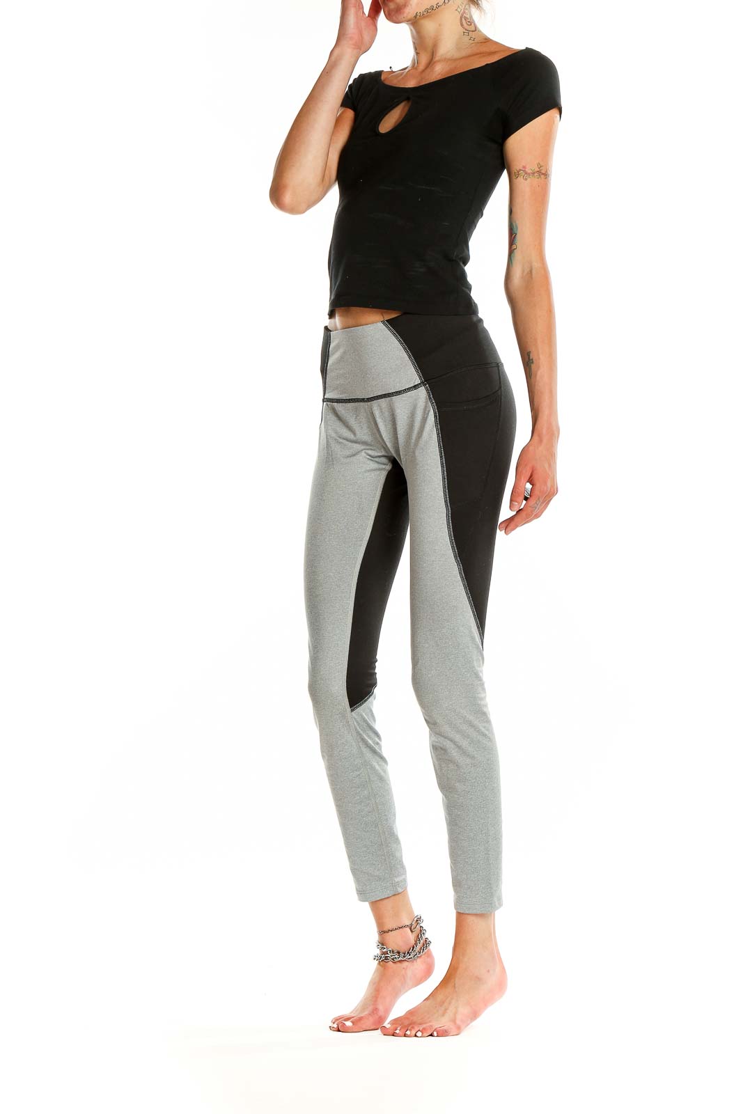 Front view of gray and black color block high-waisted activewear leggings
