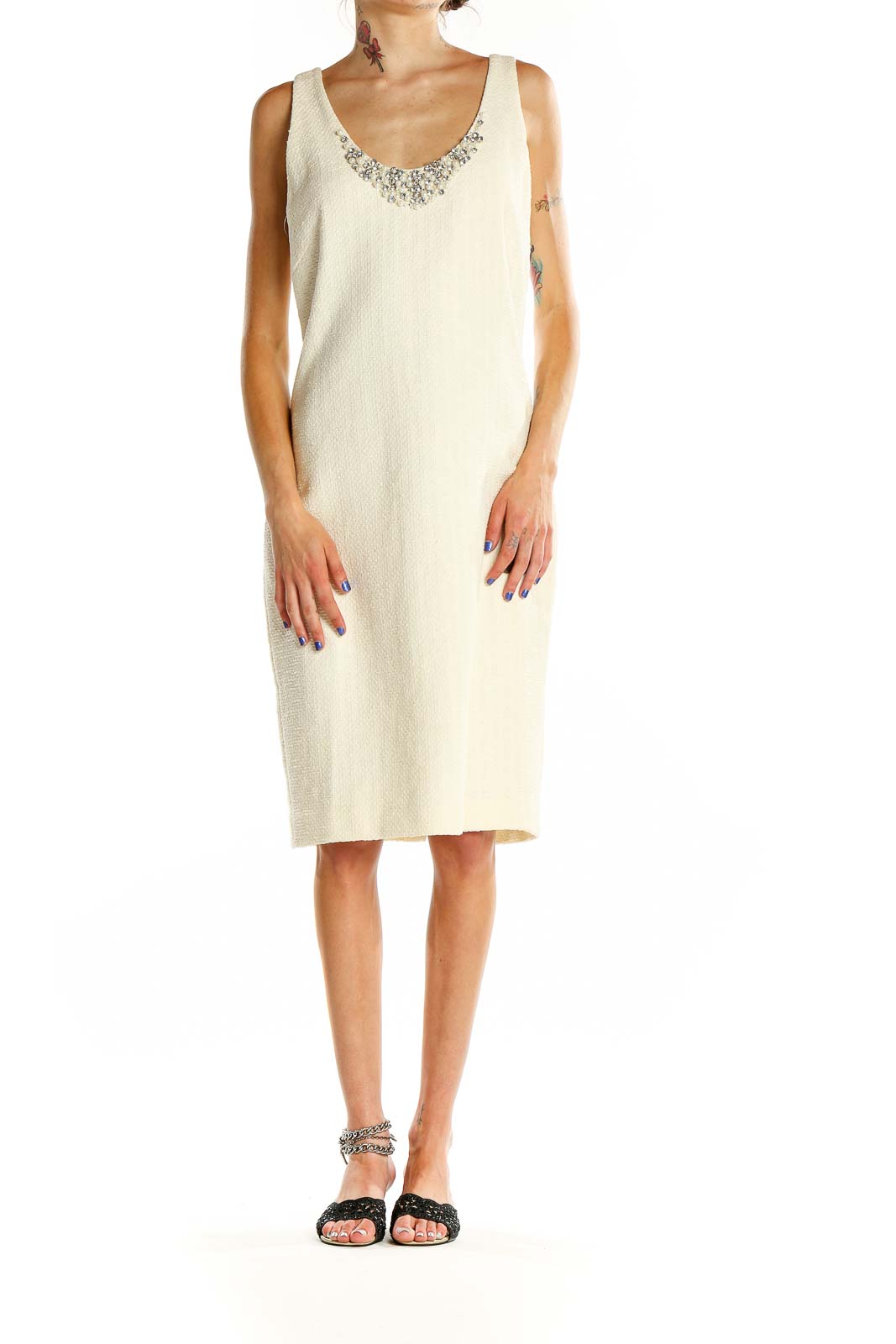 Front view of Magaschoni Collection cream sheath dress with embellished neckline