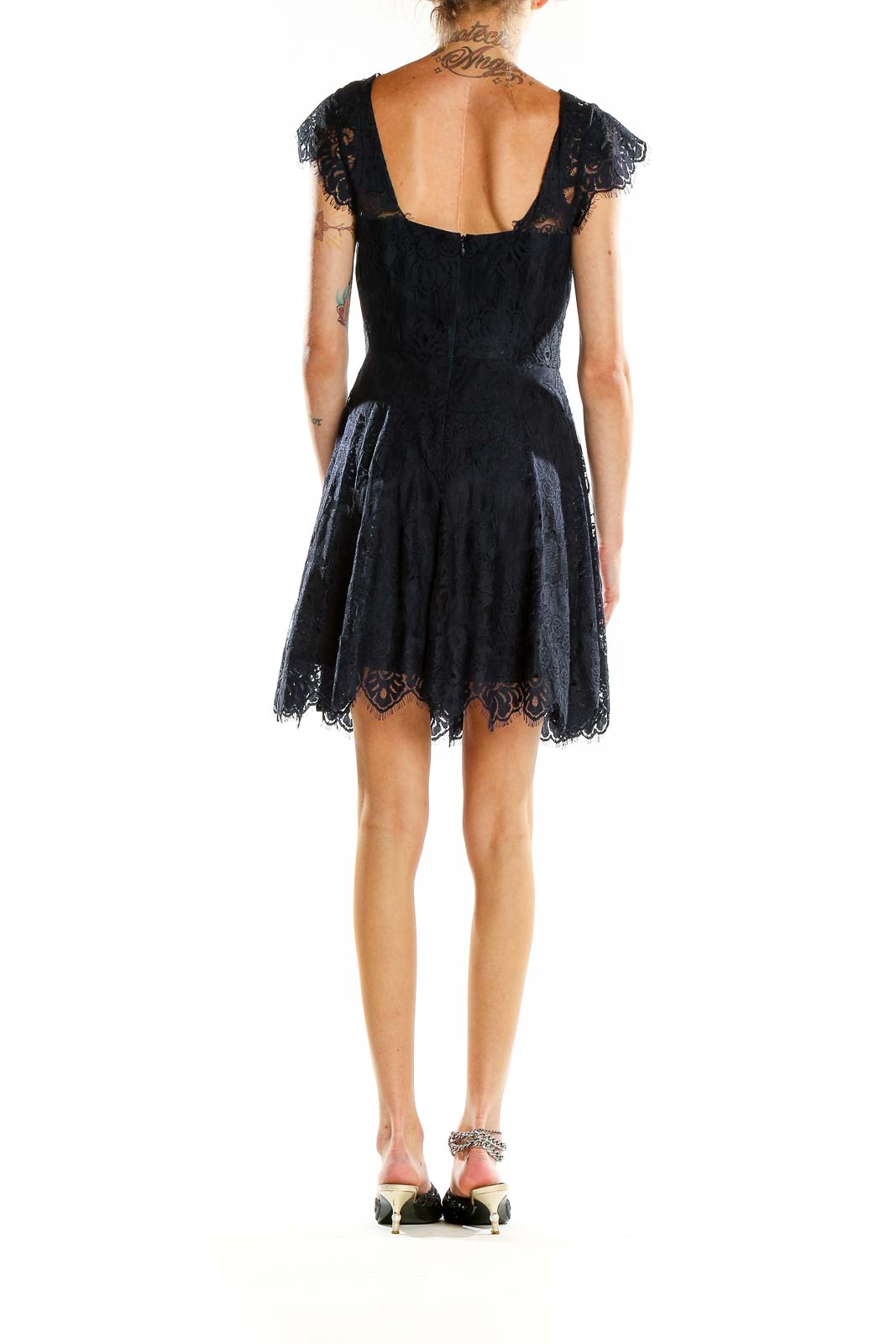 Back view of BB Dakota black lace cocktail dress showing low-cut back