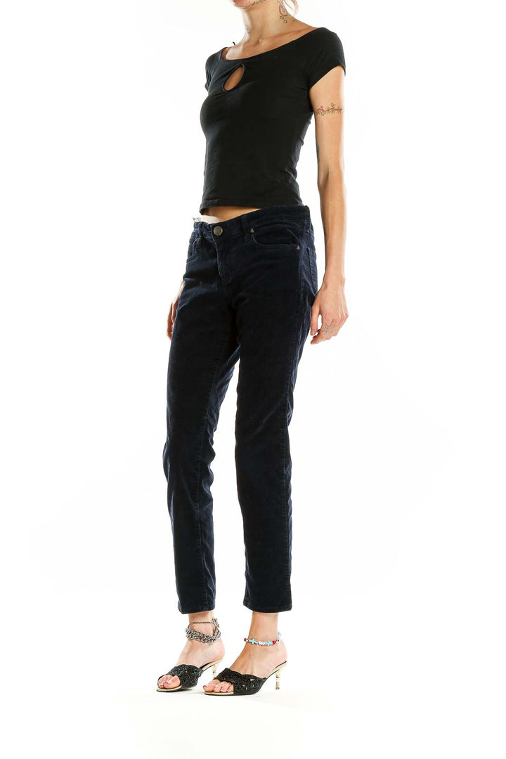 Front view of KUT from the Kloth navy corduroy straight leg pants on model