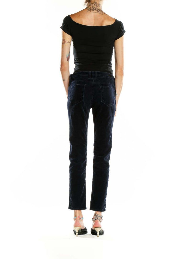 Back view of KUT from the Kloth navy corduroy straight leg pants on model