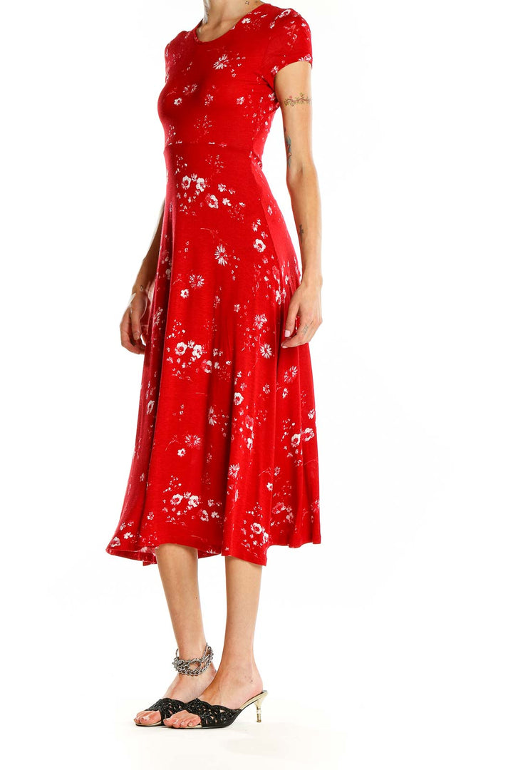 Front view of Urban Outfitters red floral midi dress with short sleeves