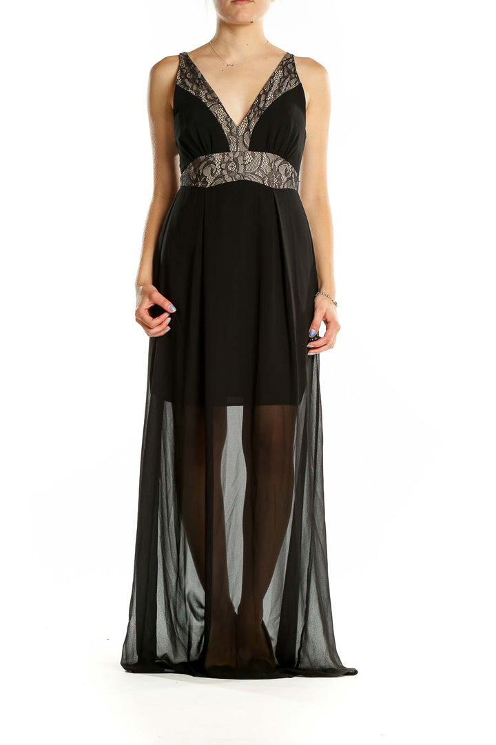 Front view of BCBGeneration black maxi dress with lace-trimmed plunging neckline and sheer overlay