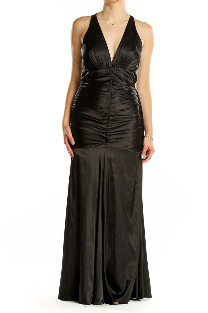 Front view of black ruched mermaid evening gown by Jessica McClintock