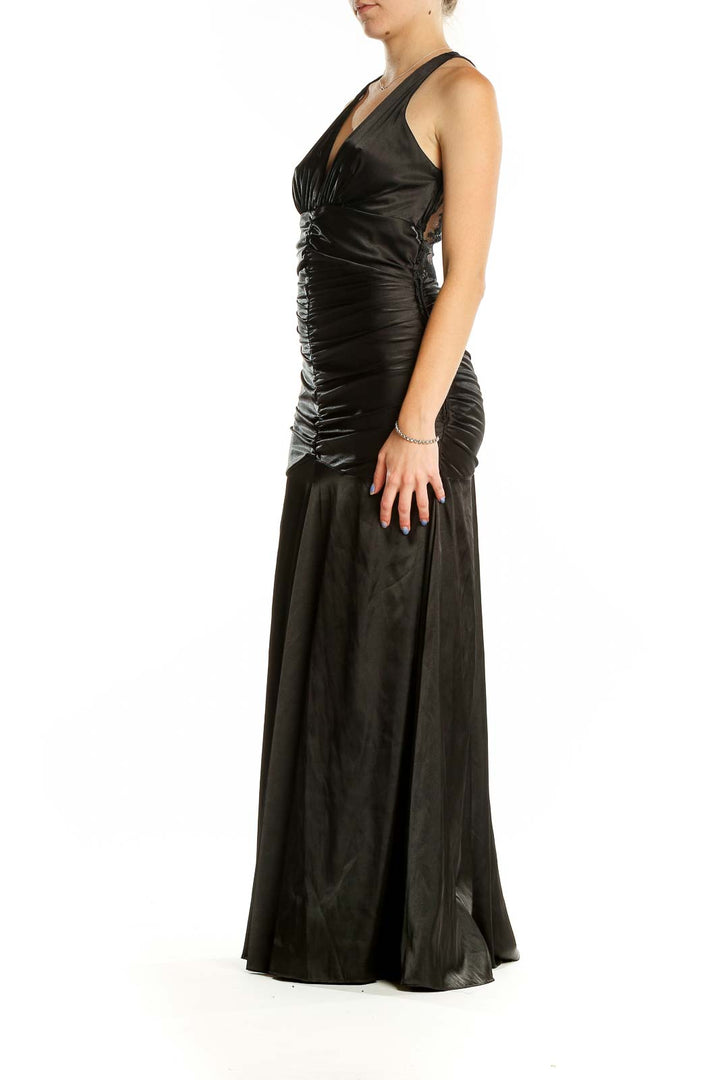 Front view of black ruched mermaid evening gown by Jessica McClintock