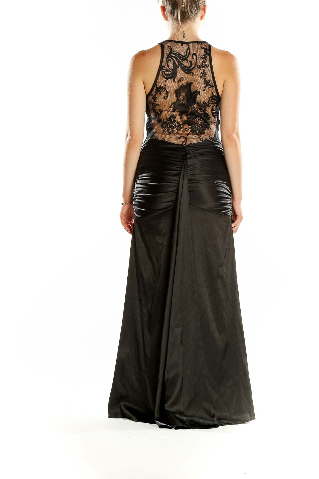 Back view of black mermaid evening gown with sheer embroidered panel by Jessica McClintock