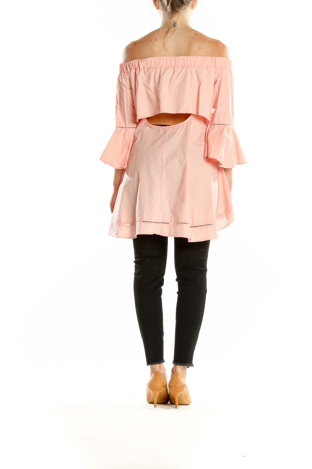 Back view of pink off-shoulder tunic top showing high-low hemline