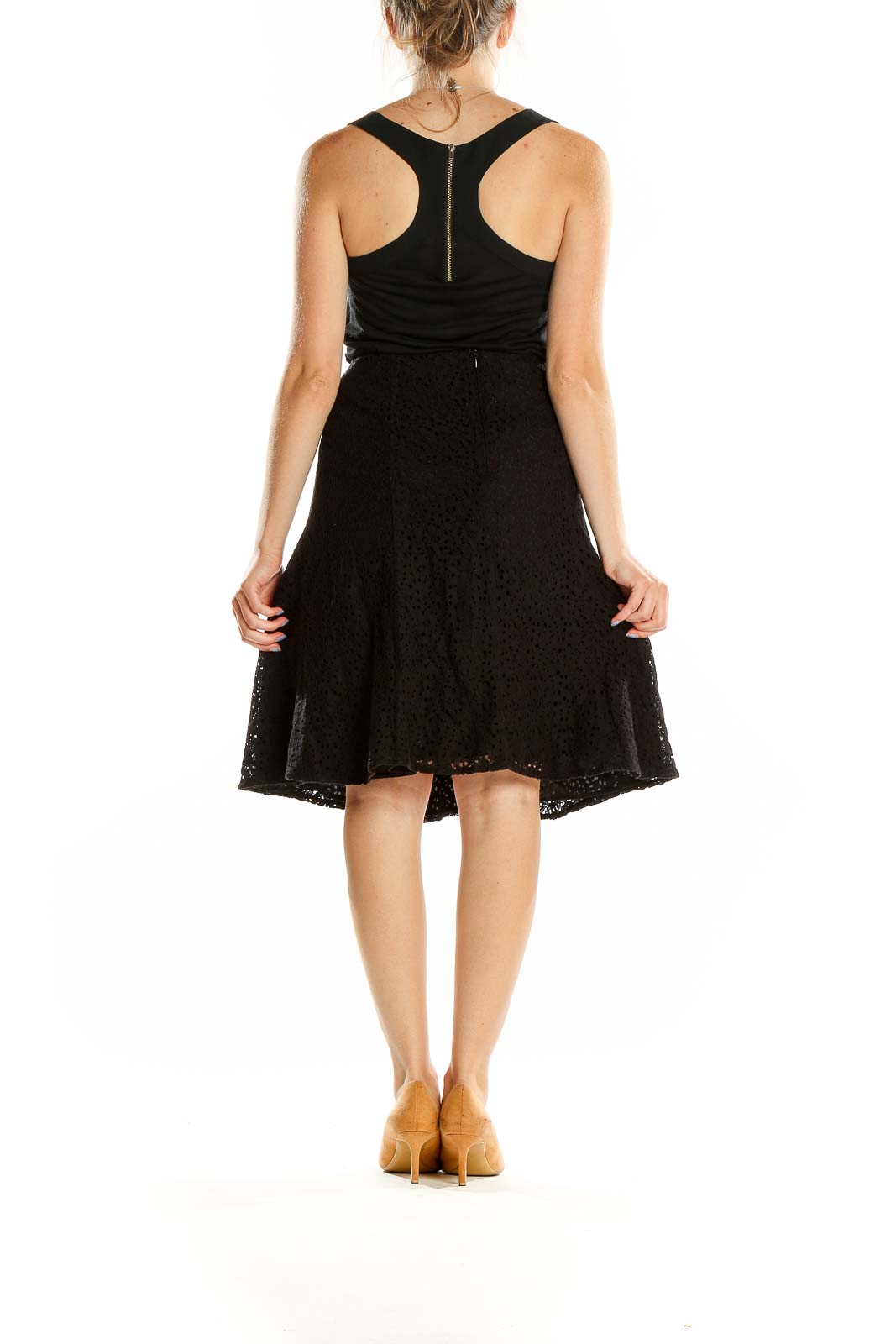 Back view of Nicole by Nicole Miller black lace A-line knee-length skirt on model