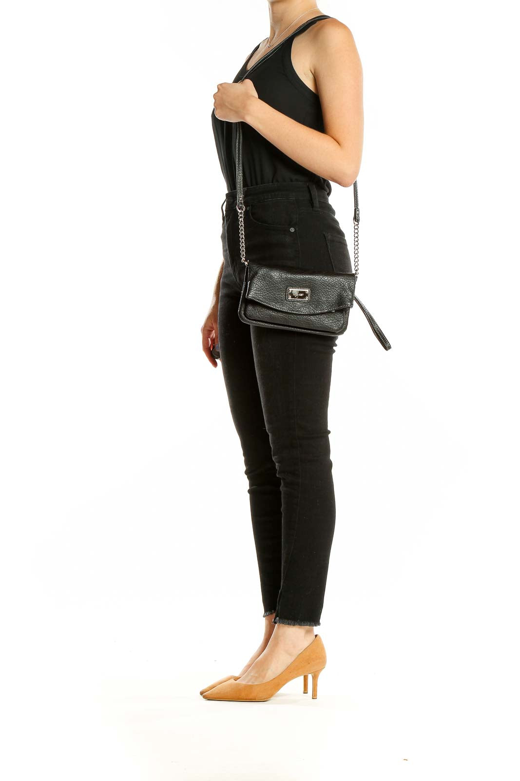 Front view of Nine West black leather crossbody bag with silver hardware