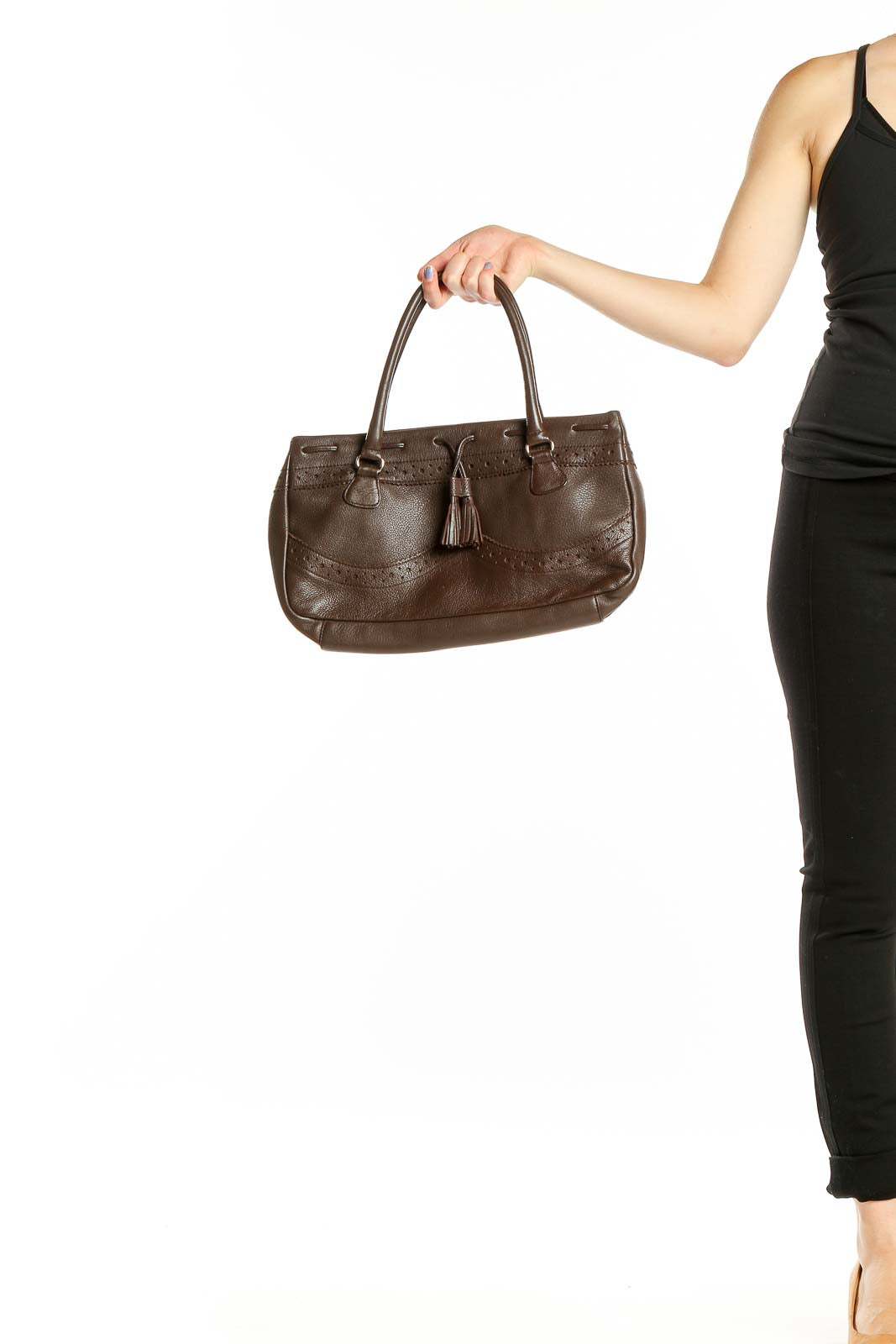 Front view of Maxx New York brown leather shoulder bag with tassel