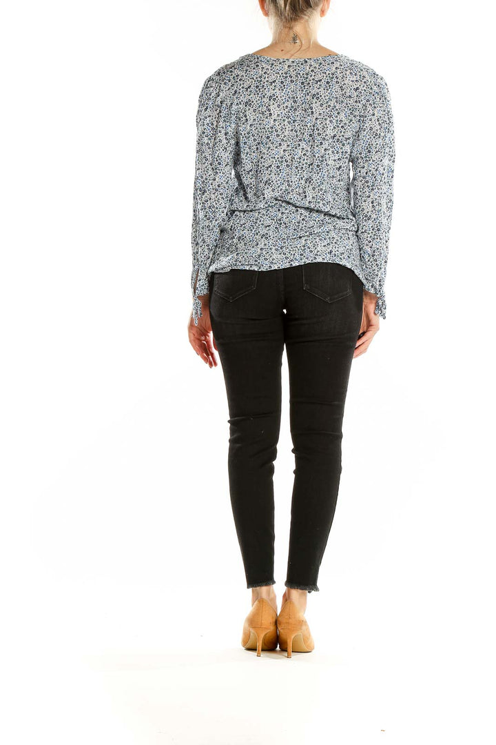 Back view of Cynthia Rowley blue floral print rayon blouse