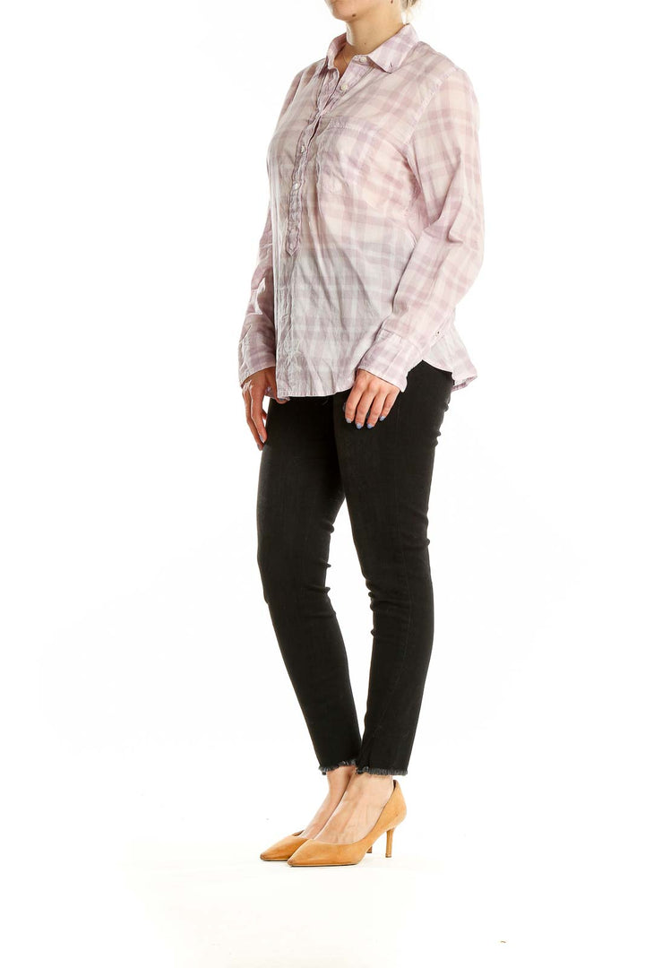 Front view of J.Crew pink plaid cotton button-up shirt on model