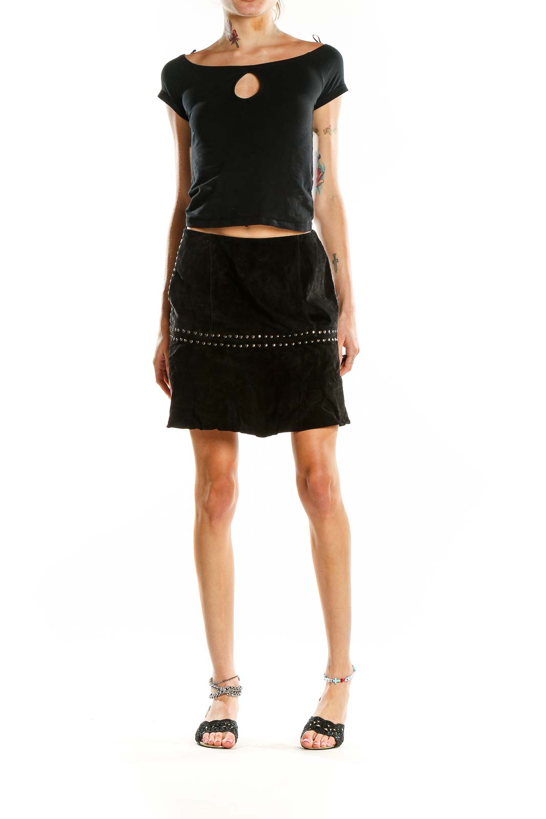 Front view of Willow & Clay black leather studded mini skirt