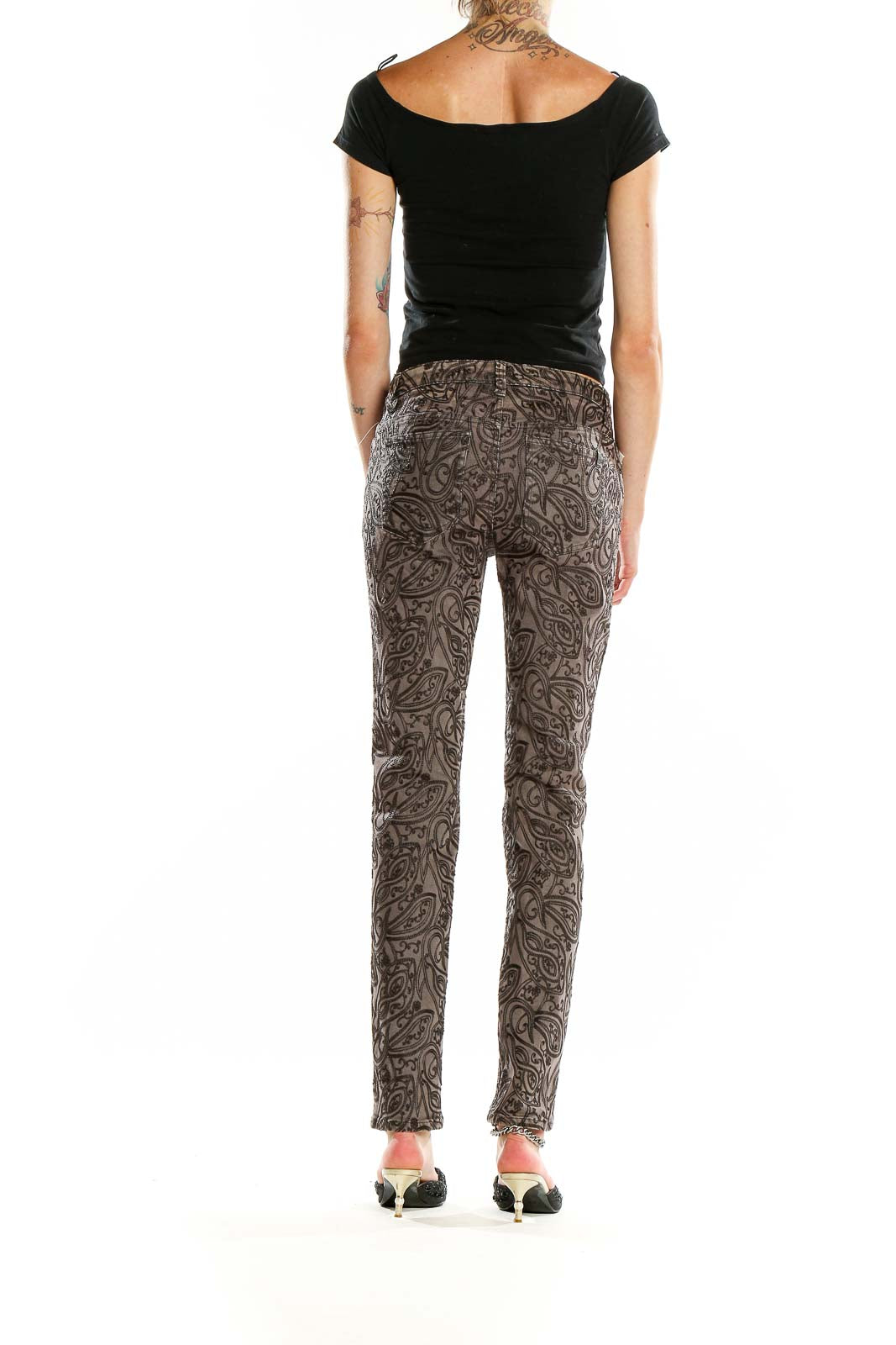 Back view of Joe's gray paisley print skinny jeans on model