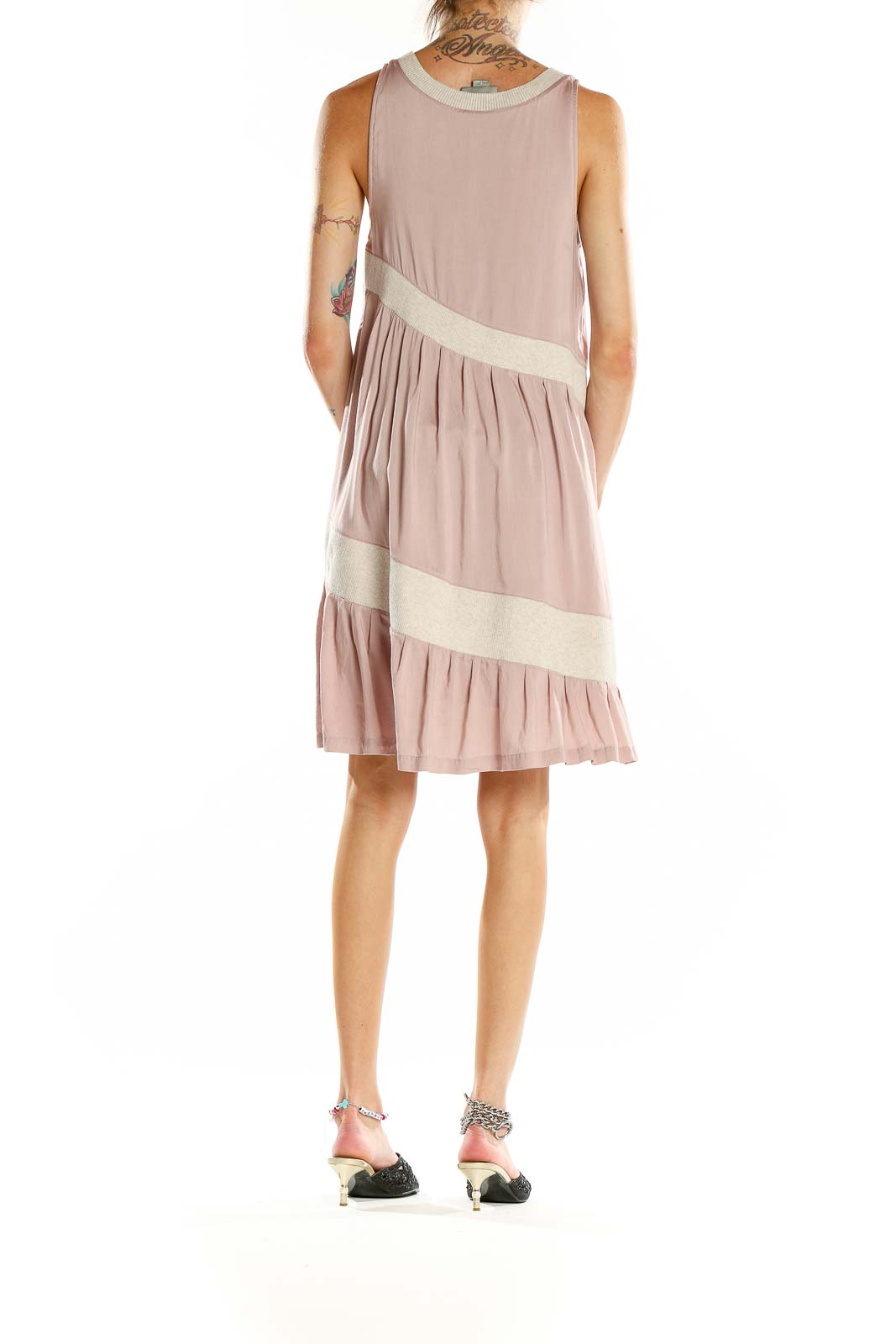 Back view of blush Maeve tiered sleeveless midi dress showing flowing silhouette