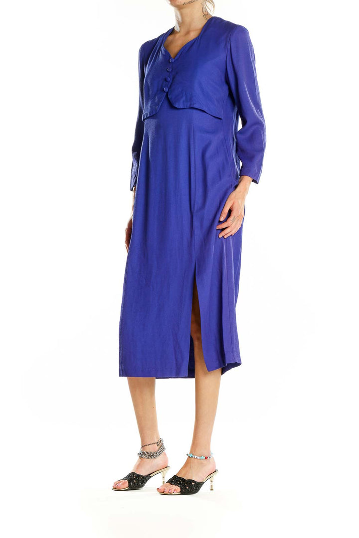 Front view of Alexis royal blue midi dress with V-neckline and button details