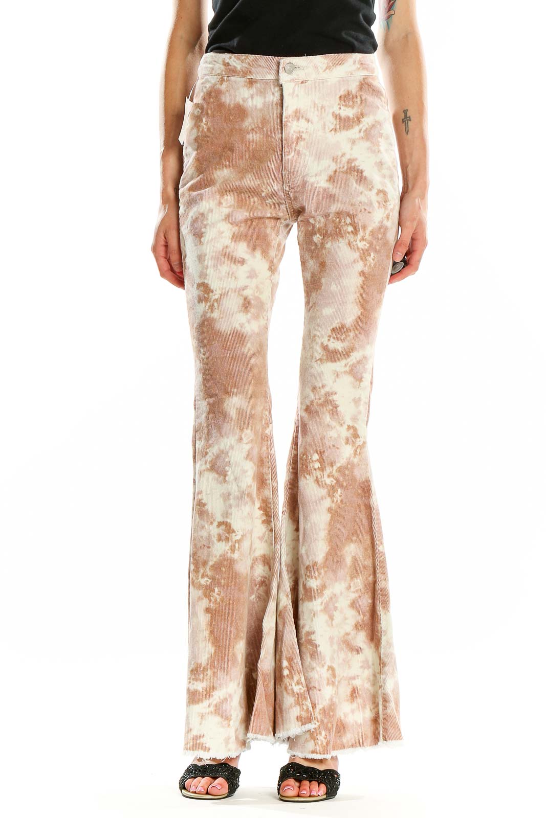 Front view of altar'd state beige tie-dye flared pants