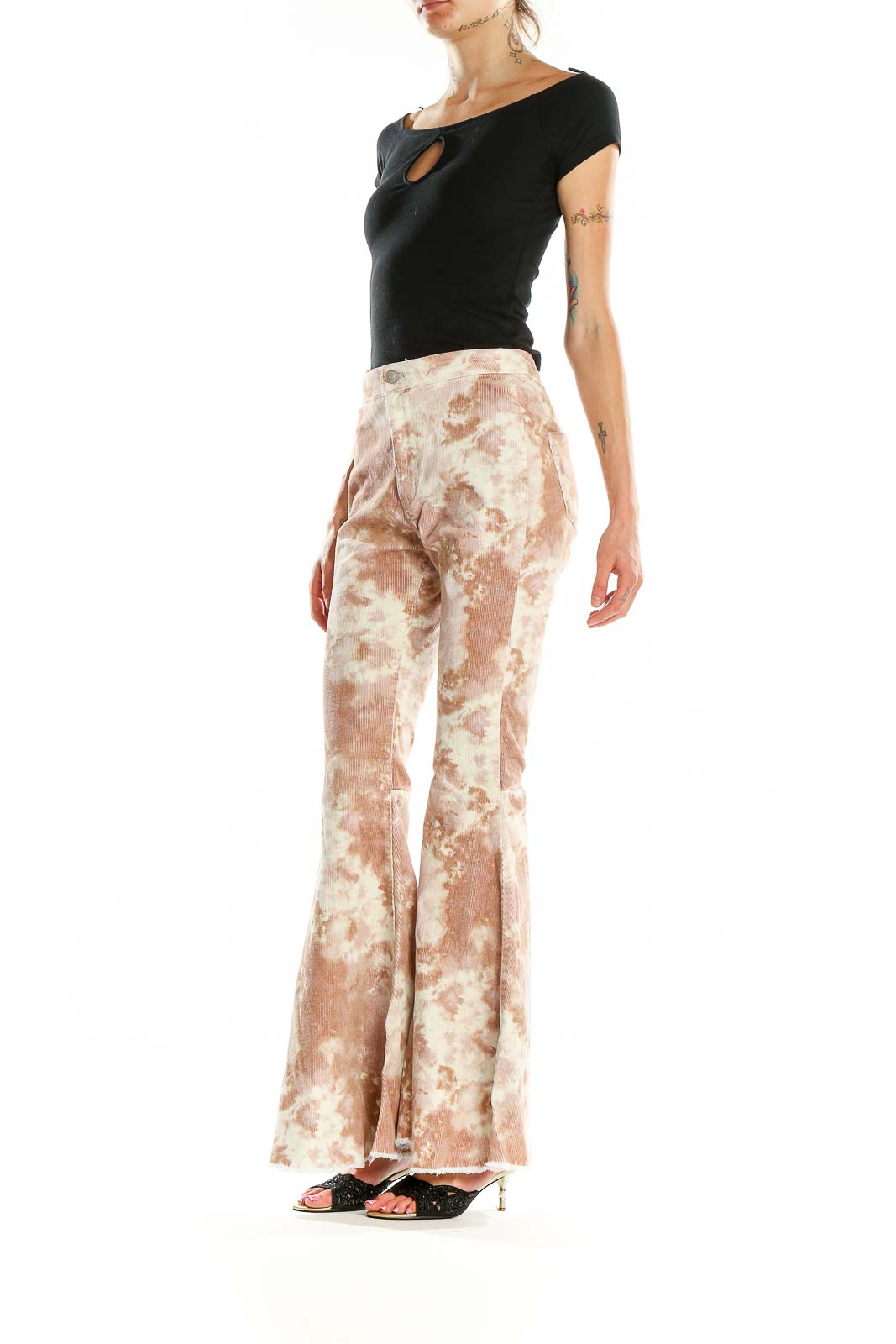 Front view of altar'd state beige tie-dye flared pants